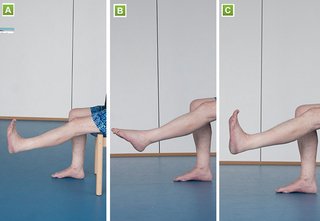 A seated man is lifting his left leg up off the floor and flexing and then pointing his  left foot.